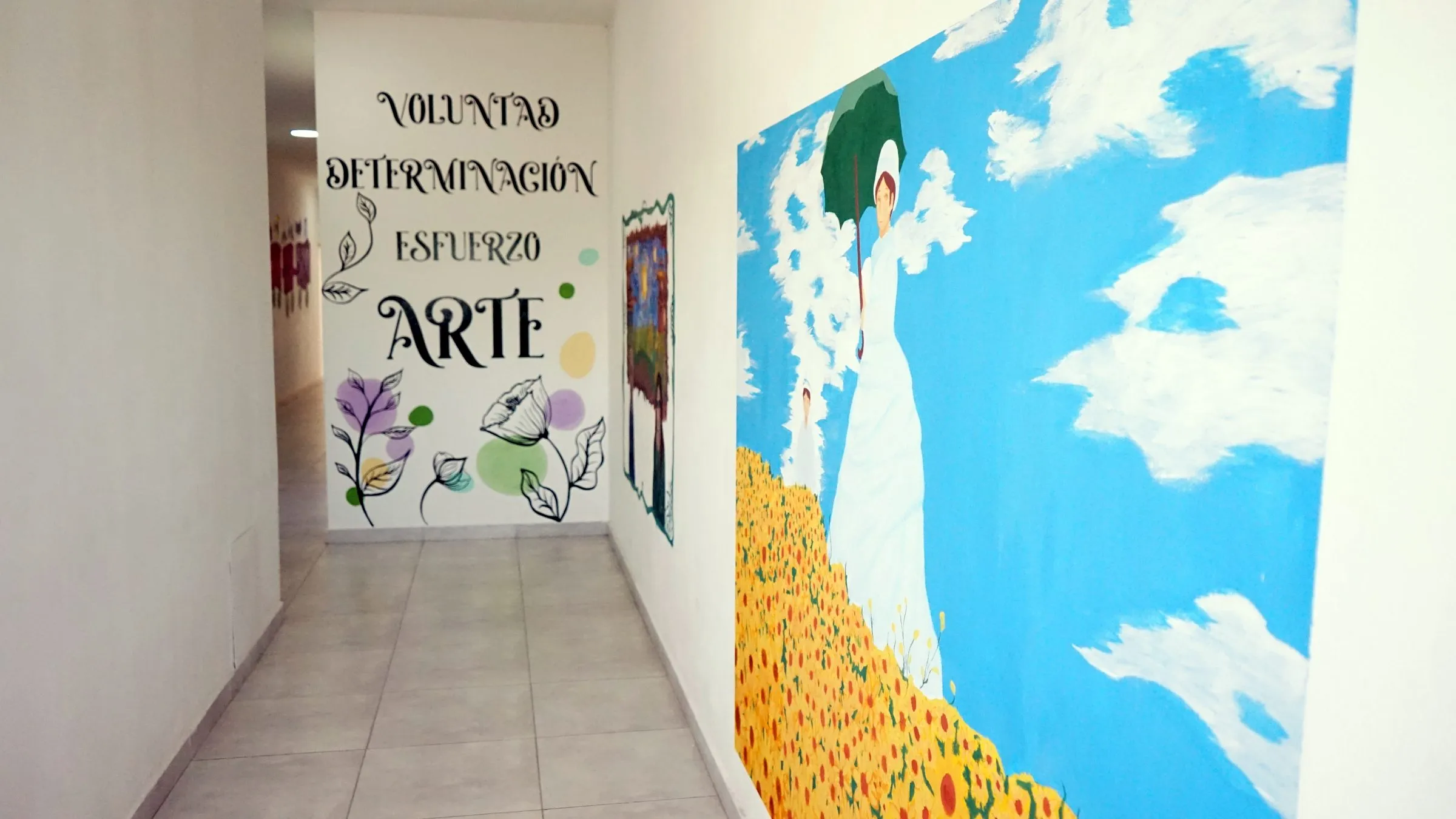 Mural con las palabras Voluntad, Determinación, Esfuerzo y Arte